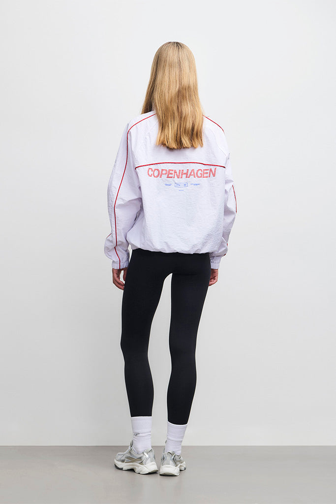 ARKK Apparel ARKK CPH Track Jacket | Off White Cherry Solid Blue Track Jacket